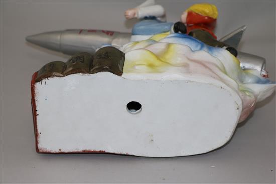 A mid/late 20th century Chinese propaganda polychrome ceramic group, 14.5in.